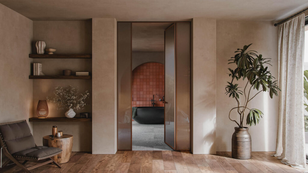 Tall, sleek swing door with dark frame in modern beige interior featuring wooden floor and decorative plants.
